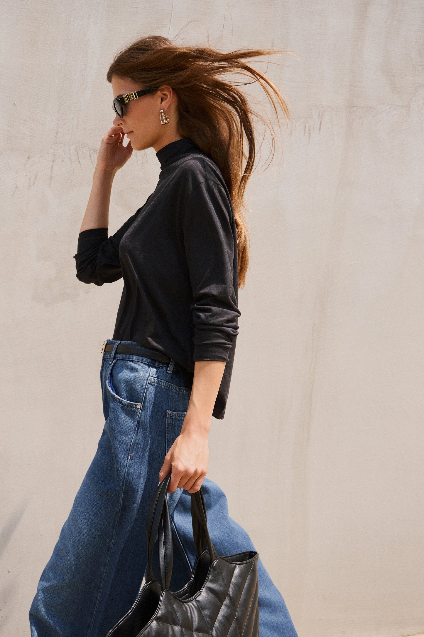 Blusa manga larga cuello alto