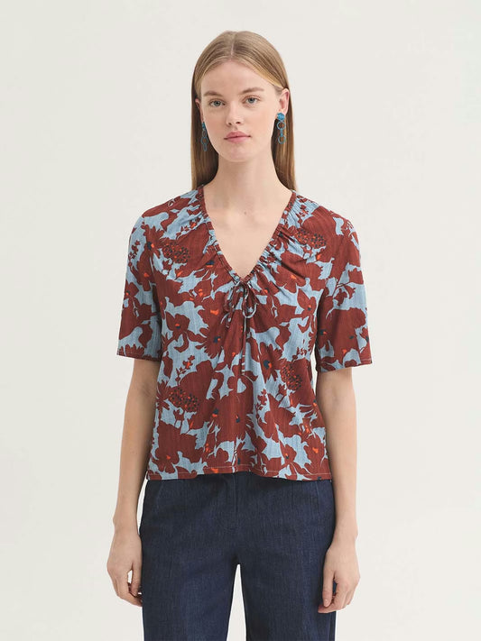 Top Penelope Flowers de Nice Things en color turquesa claro
