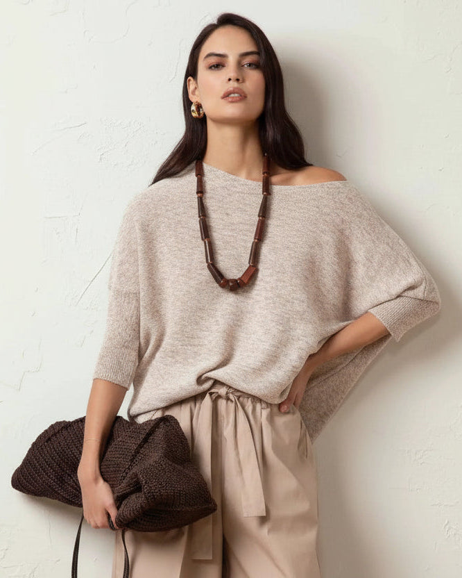 Jersey de punto ligero con brillo suave beige rosado