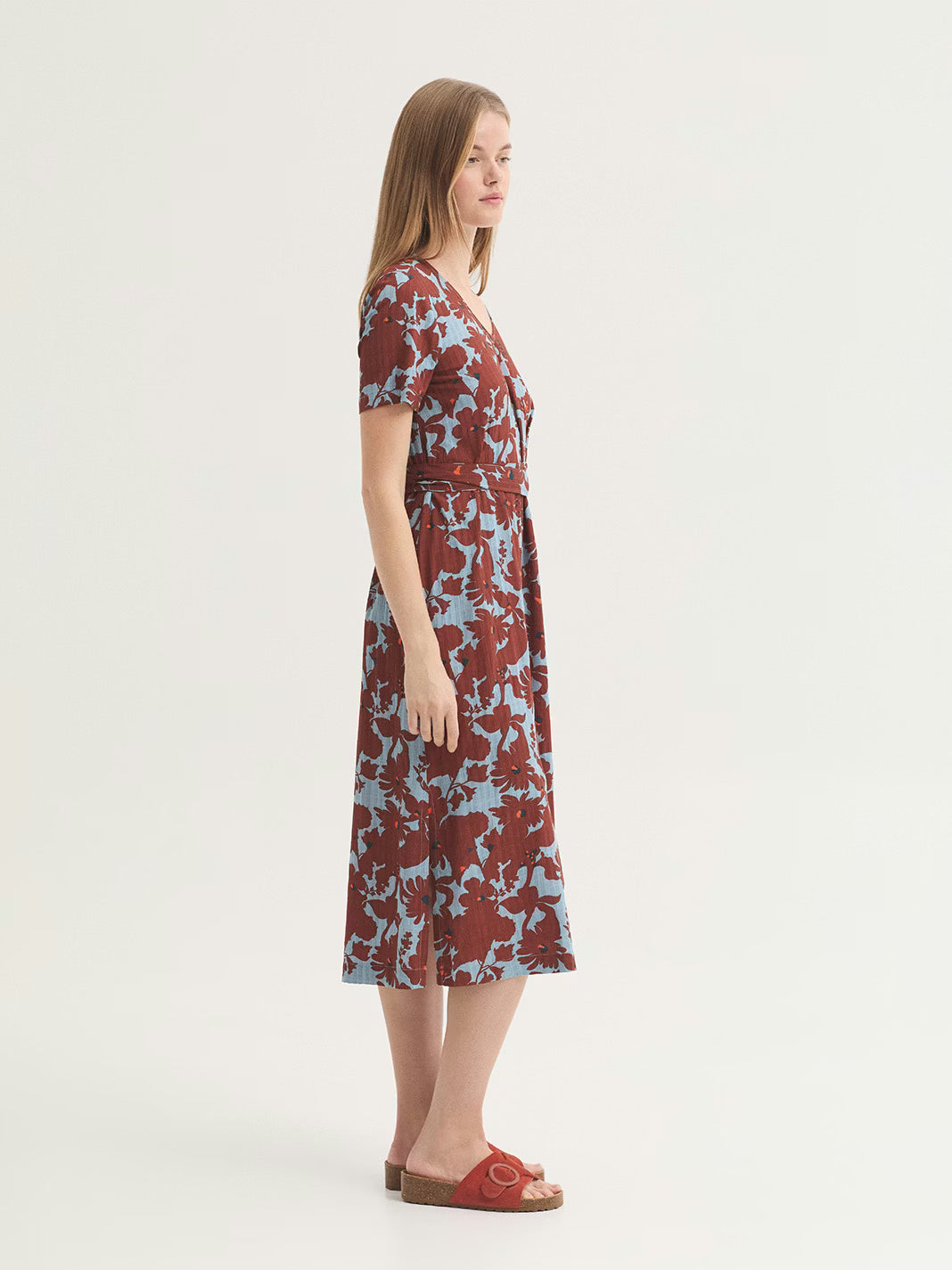 Vista lateral de vestido Penelope Flowers turquesa