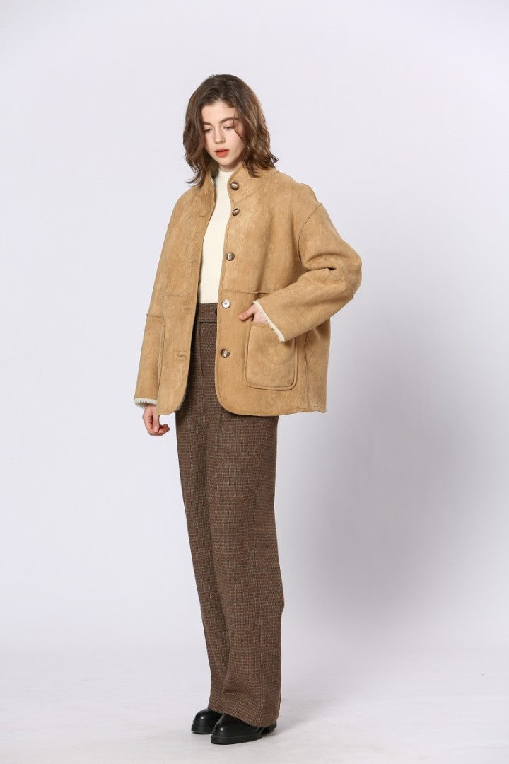 Chaqueta reversible cuello alto en tonos beige — vista frontal